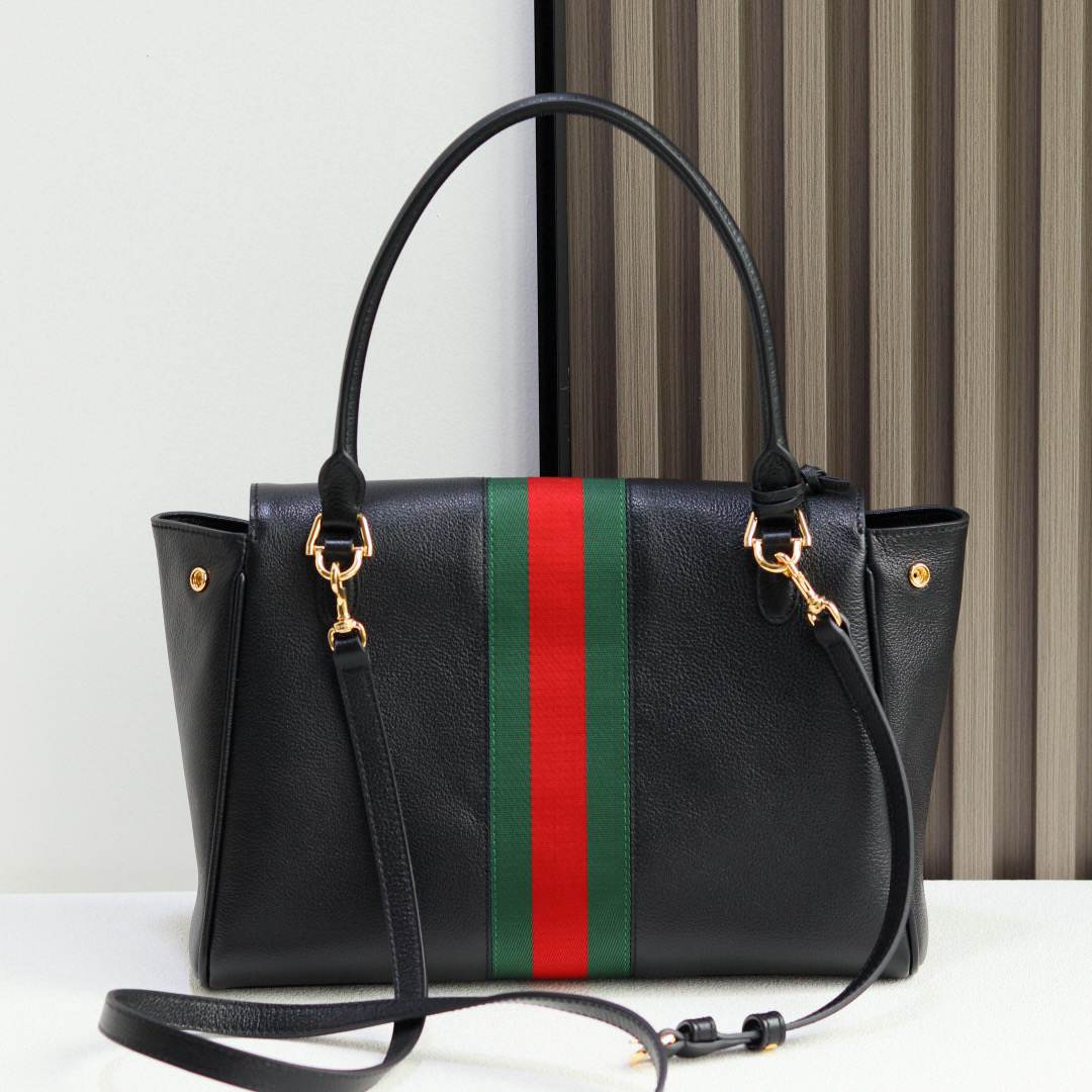 GG Paparazzo medium top handle bag
